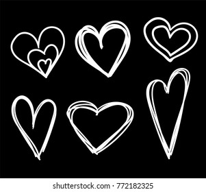 Hand drawn hearts set isolated. Design elements for Valentine's day. Collection of doodle sketch hearts hand drawn with ink. Vector illustration 10 EPS.
