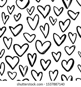 Hand drawn hearts. Vector seamless pattern. Repetetive pattern in black and white. Perfect for wrapping paper, textile, fabric and backdrops.