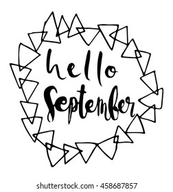 Hand drawn hello september with geometric frame on white background. Modern Calligraphy
