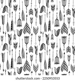 Hand drawn hipster arrows seamless pattern. Boho style ornament with simple arrows with feathers. Black and white vector background. Abstract pen drawing seamless texture. Doodle and tribal style.