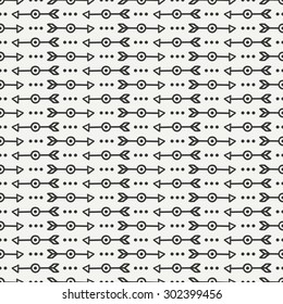 Hand drawn hipster seamless pattern with ethnic arrows. Wrapping paper. Scrapbook paper. Doodles style. Tiling. Tribal native vector illustration. Aztec background. Stylish graphic texture.
