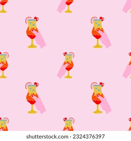 Hand drawn hand holding a cocktail seamless pattern. Textured lino cut style summer illustrations backdrop. Playful cute bright yellow, orange and pink colors wallpaper.