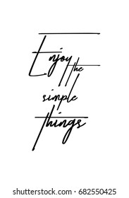 Hand drawn holiday lettering. Ink illustration. Modern brush calligraphy. Isolated on white background. Enjoy the simple things.