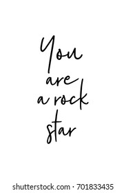 Hand drawn holiday lettering. Ink illustration. Modern brush calligraphy. Isolated on white background. You are a rock star.