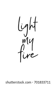 Hand drawn holiday lettering. Ink illustration. Modern brush calligraphy. Isolated on white background. Light my fire.