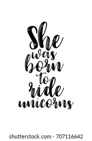 Hand drawn holiday lettering. Ink illustration. Modern brush calligraphy. Isolated on white background. She was born to ride unicorns.