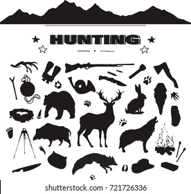 hand drawn hunting isolated attribute set with silhouettes of forest animals, gun, knife, mountains etc