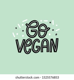 Hand drawn illustrated lettering quote - go vegan. Great typography for poster, card or restaurant. Healthy food hand drawn motto