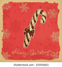 Hand - drawn illustration- Candy cane with bow and  snowflakes, grunge frame on old paper background 
