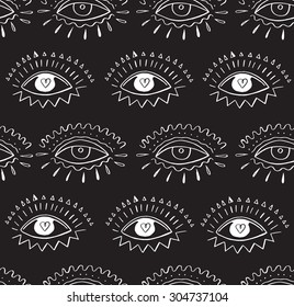 Hand drawn indian aztec tribal eye with feathers fashion seamless pattern.