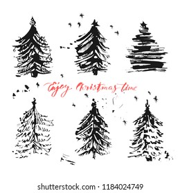 Hand drawn ink Christmas tree set. Grunge rough brush strokes style. For festive design, cards and invitations.