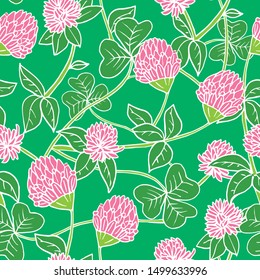Hand drawn ink and color seamless vector floral pattern. Bright pink clover flowers with green leaves on dark blue background