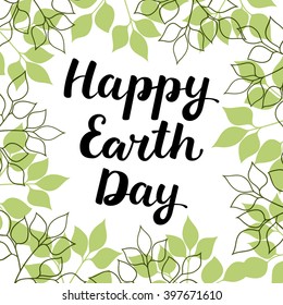 Hand drawn ink lettering "Happy Earth Day" isolated black on white background with green leaves. Handwritten vector calligraphy. Use for print cards, invitations, web banners. All letters easy to edit
