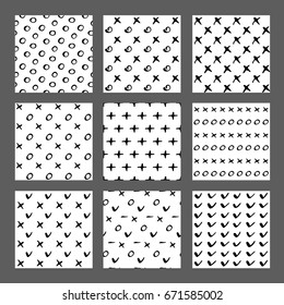 Hand drawn ink seamless pattern set. Simple Vector backgrounds with dots, stripes, lines, waves, hearts, scratches.