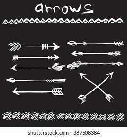 Hand drawn ink set of arrows and tribal ornaments.