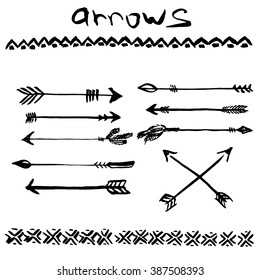 Hand drawn ink set of arrows and tribal ornaments.