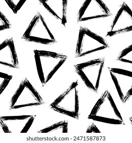 Hand drawn ink triangles seamless pattern. Trendy monochrome doodles and brush marks. Simple abstract background. Great for textile, fabric, wallpaper, wrapping, scrapbook and packaging