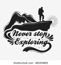 Hand drawn Inspiration and Motivational Typography for t-shirt print. Never stop exploring. Travel/adventure/climbing poster with mountains and backpacker.