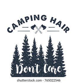 Hand drawn inspirational label with crossed axes and pine trees textured vector illustrations and "Camping hair - don't care" lettering.