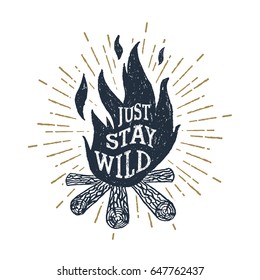 Hand drawn inspirational label with textured bonfire vector illustration and "Just stay wild" lettering.