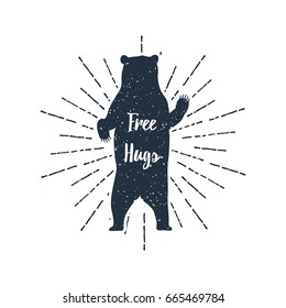 Hand drawn label grizzly bear vector illustration and "Free Hugs!" inspirational lettering. EPS10