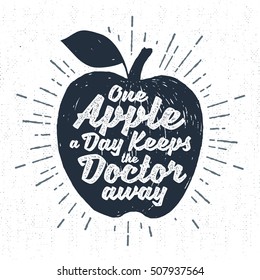 Hand drawn label with textured apple vector illustration and "One apple a day keeps the doctor away" lettering.