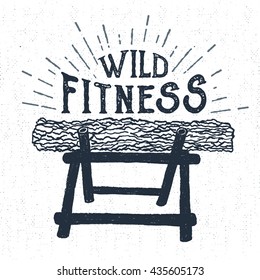 Hand drawn label with textured log vector illustration and "Wild fitness" lettering.