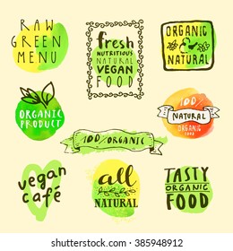 Hand drawn labels collection for vegetarian restaurant or cafe menu. Retro style set of bio, organic, eco food logo templates. Floral vintage elements and watercolor splashes in vector. Eco lifestyle