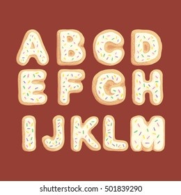 Hand drawn latin alphabet A-M in shape of cookies with vanila cream