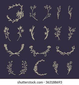 Hand drawn laurel set made in vector. Leaves and flowers garlands. Romantic floral design elements.