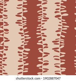 Hand drawn leaves in vertical stripes in a warm color bohemian pattern. Vector seamless pattern design for textile, fashion, paper, packaging and branding