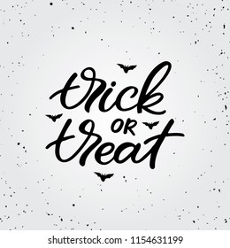 Hand drawn lettering card. The inscription: trick or treat. Perfect design for greeting cards, posters, T-shirts, banners, print invitations.