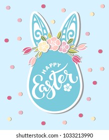 Hand drawn lettering Easter as logo, badge, icon. Template for Happy Easter Day, party invitation, greeting card, web, postcard, pet shop. Vector illustratuon with Bunny ears and pink flowers wreath.