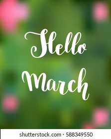 Hand drawn lettering Hello March on blur background. 
