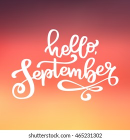 Hand drawn lettering Hello  September  White ink gradient fall background for advertising