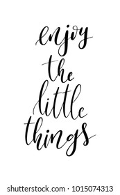 Hand drawn lettering. Ink illustration. Modern brush calligraphy. Isolated on white background. Enjoy the little things.
