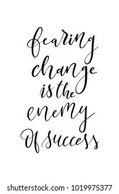 Hand drawn lettering. Ink illustration. Modern brush calligraphy. Isolated on white background. Fearing change is the enemy of success.