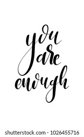 Hand drawn lettering. Ink illustration. Modern brush calligraphy. Isolated on white background. You are enough.