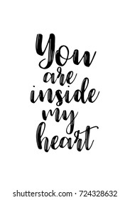 Hand drawn lettering. Ink illustration. Modern brush calligraphy. Isolated on white background. You are inside my heart.