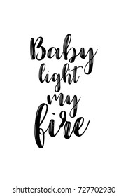 Hand drawn lettering. Ink illustration. Modern brush calligraphy. Isolated on white background. Baby light my fire.