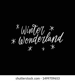 Hand drawn lettering quote template -Winter Wonderland - with illustrations around. Unique vector script saying poster. Custom 
typography print for t shirts,bags,posters,merch,banners.