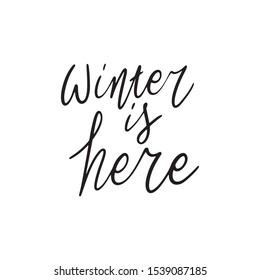 Hand drawn lettering quote template -Winter is Here - with illustrations around. Unique vector script saying poster. Custom 
typography print for t shirts,bags,posters,merch,banners.