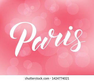 Hand drawn lettering text Paris on pink bokeh background. City in France. Modern brush calligraphy vector Illustration. Print for logo, travel, map, catalog, web site, flag, poster, blog, banner.