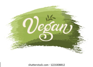 Hand drawn lettering Vegan on a paint brush stroke. Vector Ink illustration. Typography poster on black background. Organic, natural design template for cards, invitations, prints etc