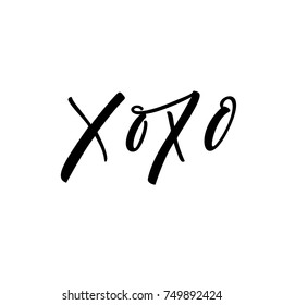 Hand drawn lettering Xoxo. Handwritten script sign or slogan. Ink illustration. Modern brush calligraphy. Isolated on white background.