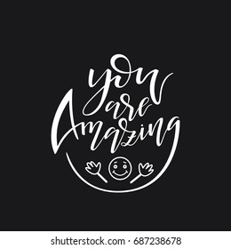 Hand drawn lettering "You are Amazing". Modern brush calligraphy isolated on black background. Inspirational typography made in vector. Design for t-shirt, greeting card and prints