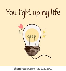 Hand drawn light bulb with quote "You light up my life" and pink heart on pastel yellow background. Cute pun for card design in love concept