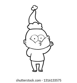 hand drawn line drawing of a bald man staring wearing santa hat