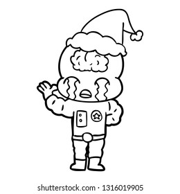 hand drawn line drawing of a big brain alien crying wearing santa hat