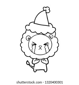 hand drawn line drawing of a crying lion wearing santa hat